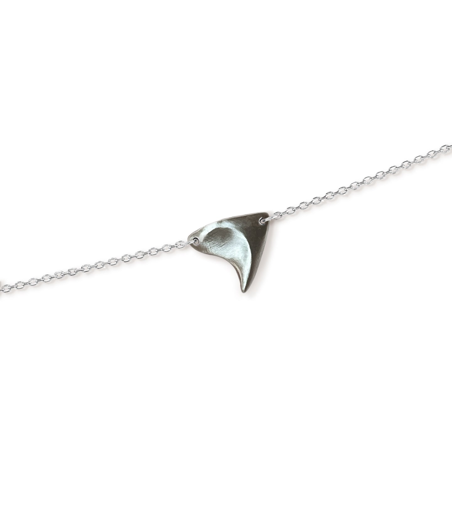 Closeup of a sterling silver rose thorn necklace in a brushed  finish on a white background