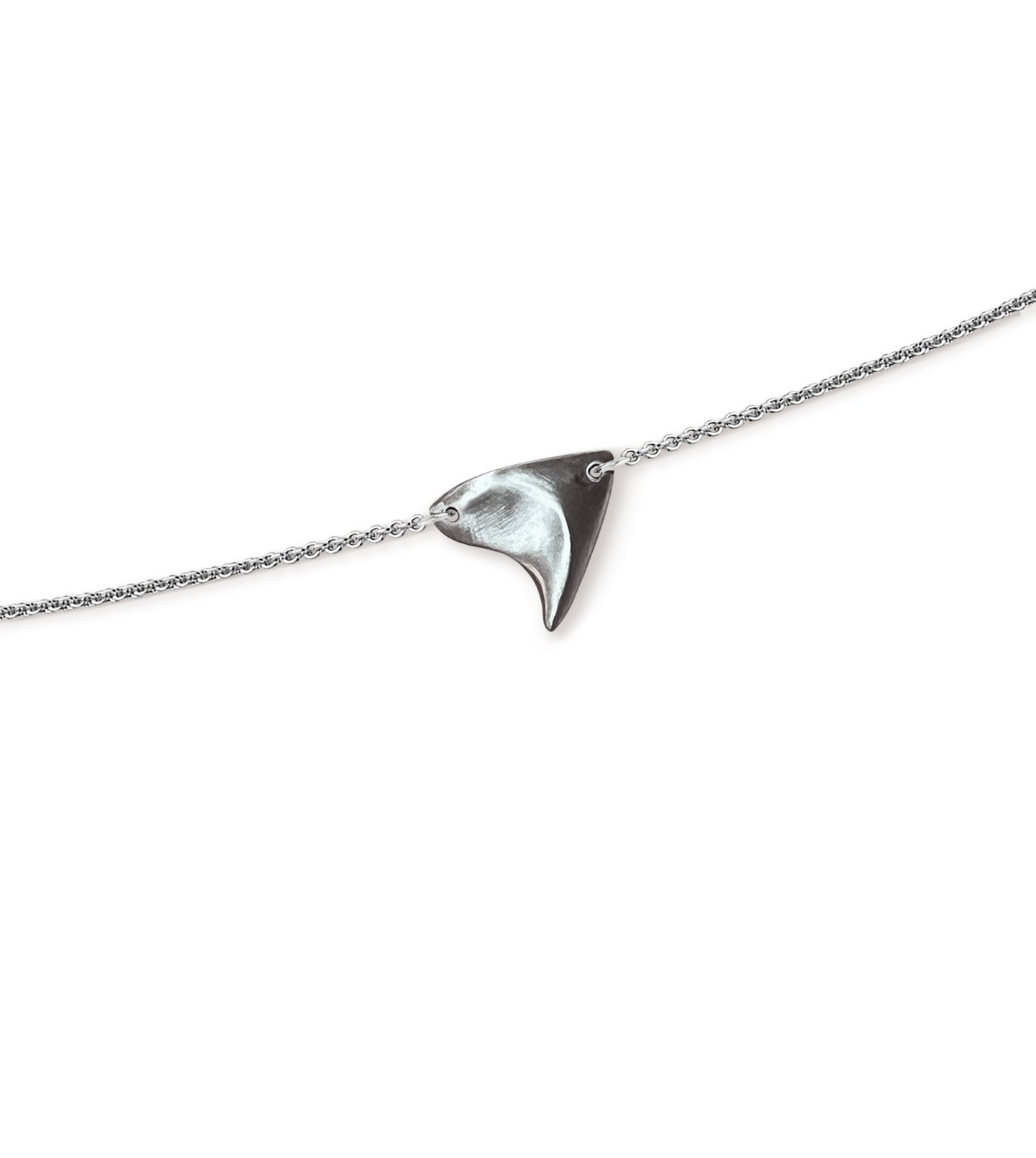 Closeup of sterling silver rose thorn in brushed matte finish