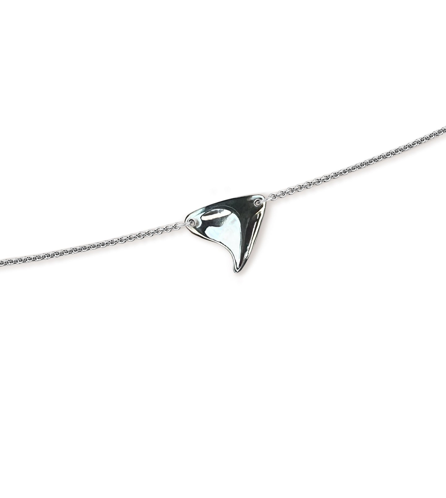 Closeup of sterling silver rose thorn in high shine finish