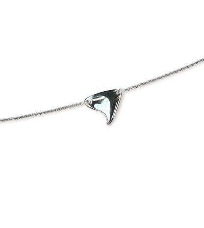 Closeup of sterling silver rose thorn in high shine finish