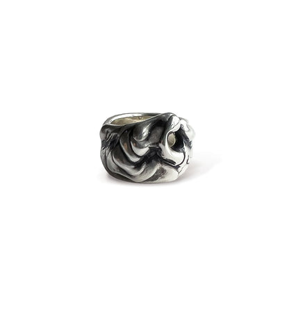 Polished sterling silver wave ring, side view on a light grey background