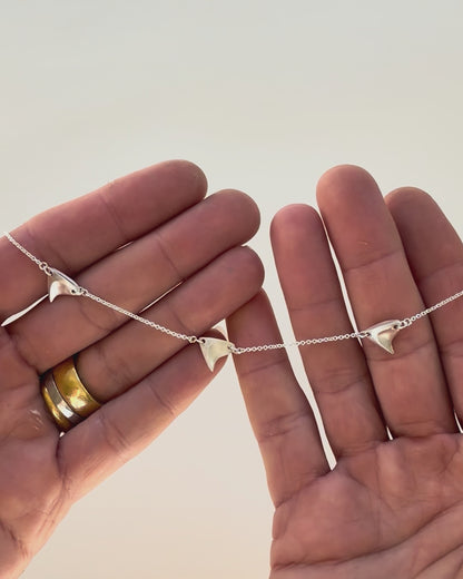 Jeweler making the sterling silver three-thorn necklace
