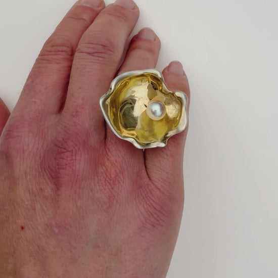 Oyster Pearl Ring video on white background worn on and off the hand