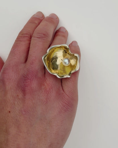 Oyster Pearl Ring video on white background worn on and off the hand