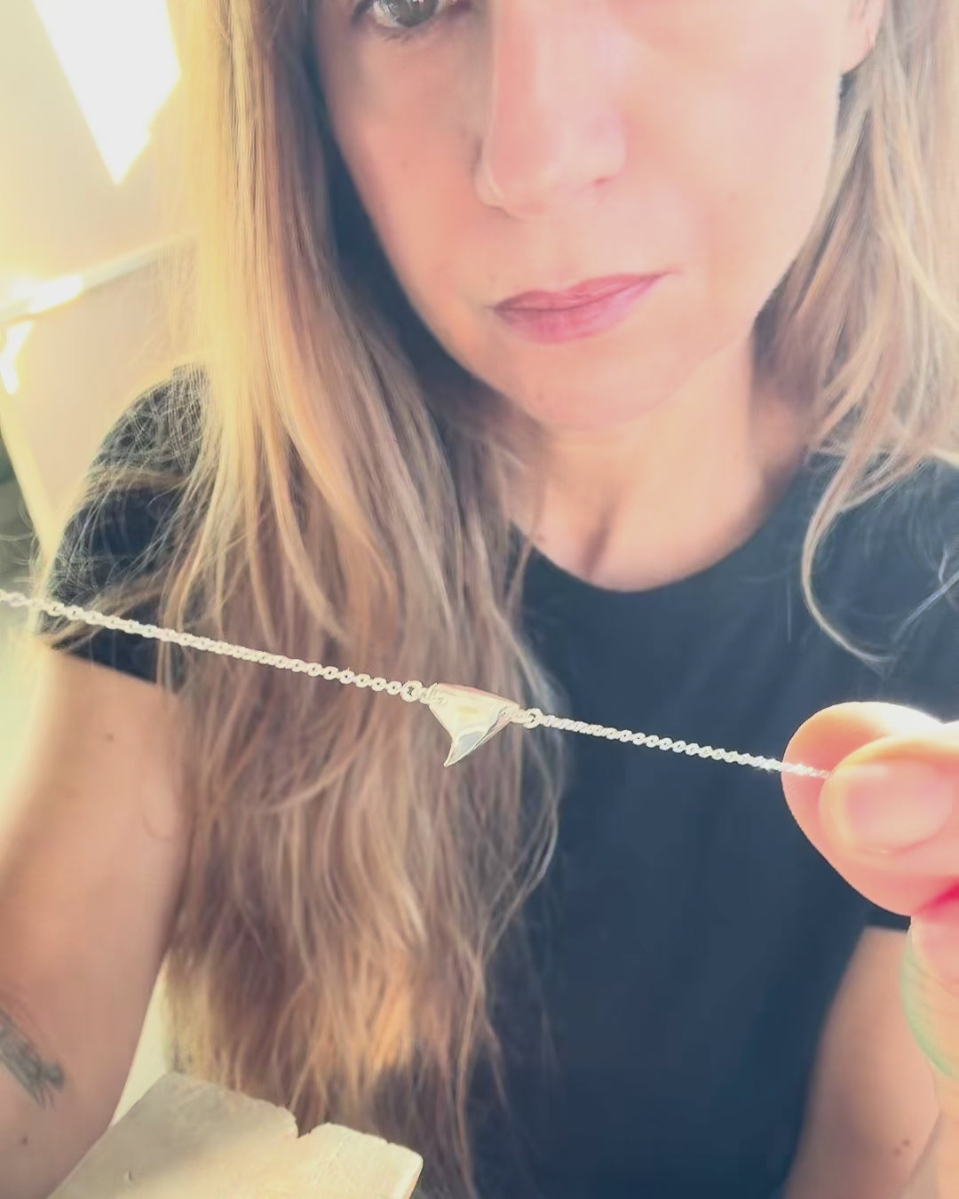 Comparison between the shiny and brushed finish thorn necklaces